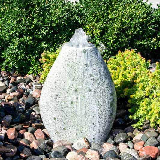 Green marble fountain shaped like an almond
