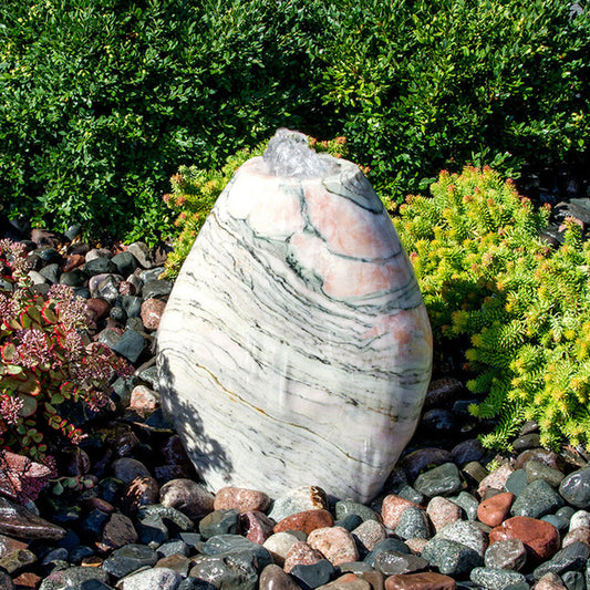 Pink marble fountain shaped like an almond