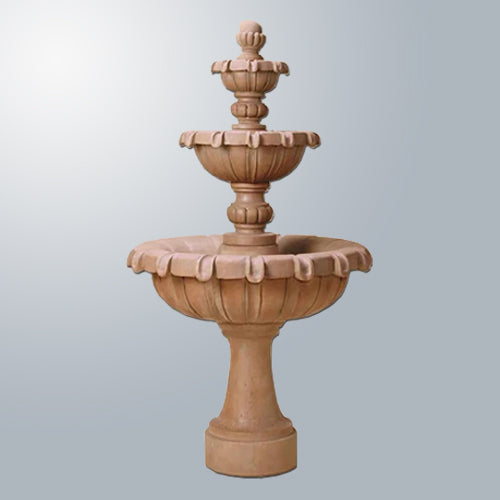A three-tiered outdoor water fountain with a classic chateau design.