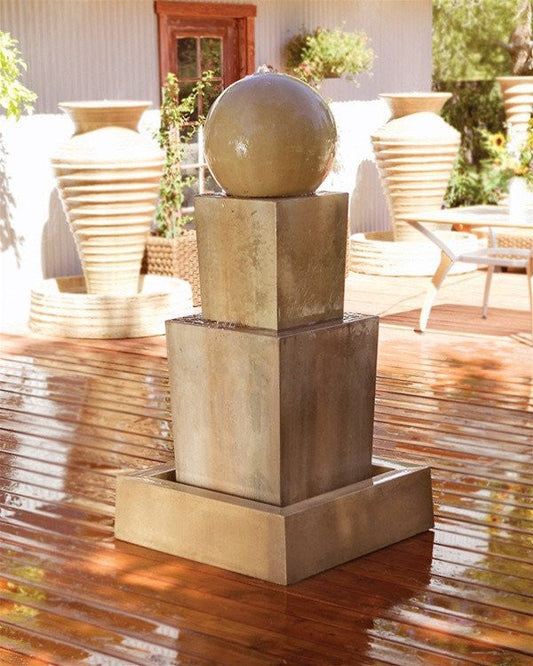 A double obtuse garden water fountain with a ball.
