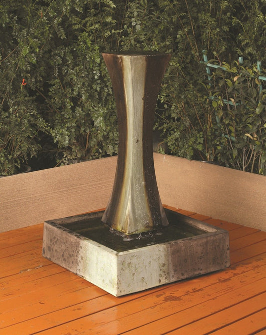 A small indoor garden water fountain.